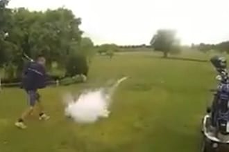 Man hitting ball for exploding golf ball prank
